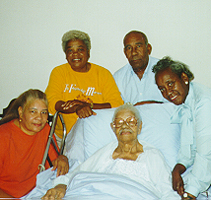 From right to left, Portia, Phil Henry Burnett, Earnestine Ward, Josephine, Corrie Lee Ward (bed)